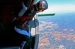 A Female Skydiver About to Exit